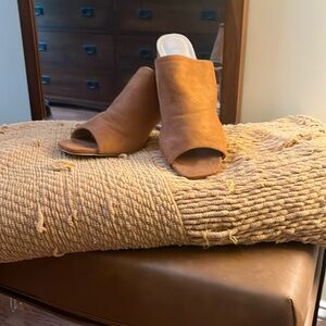 Size 11 slip ons worn once. Color is a rust orange